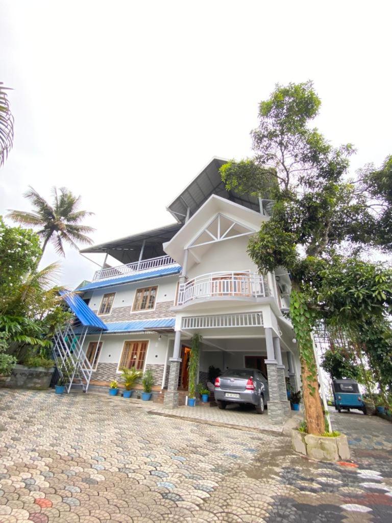 Munnar Blue Mist Acomodação com café da manhã Exterior foto
