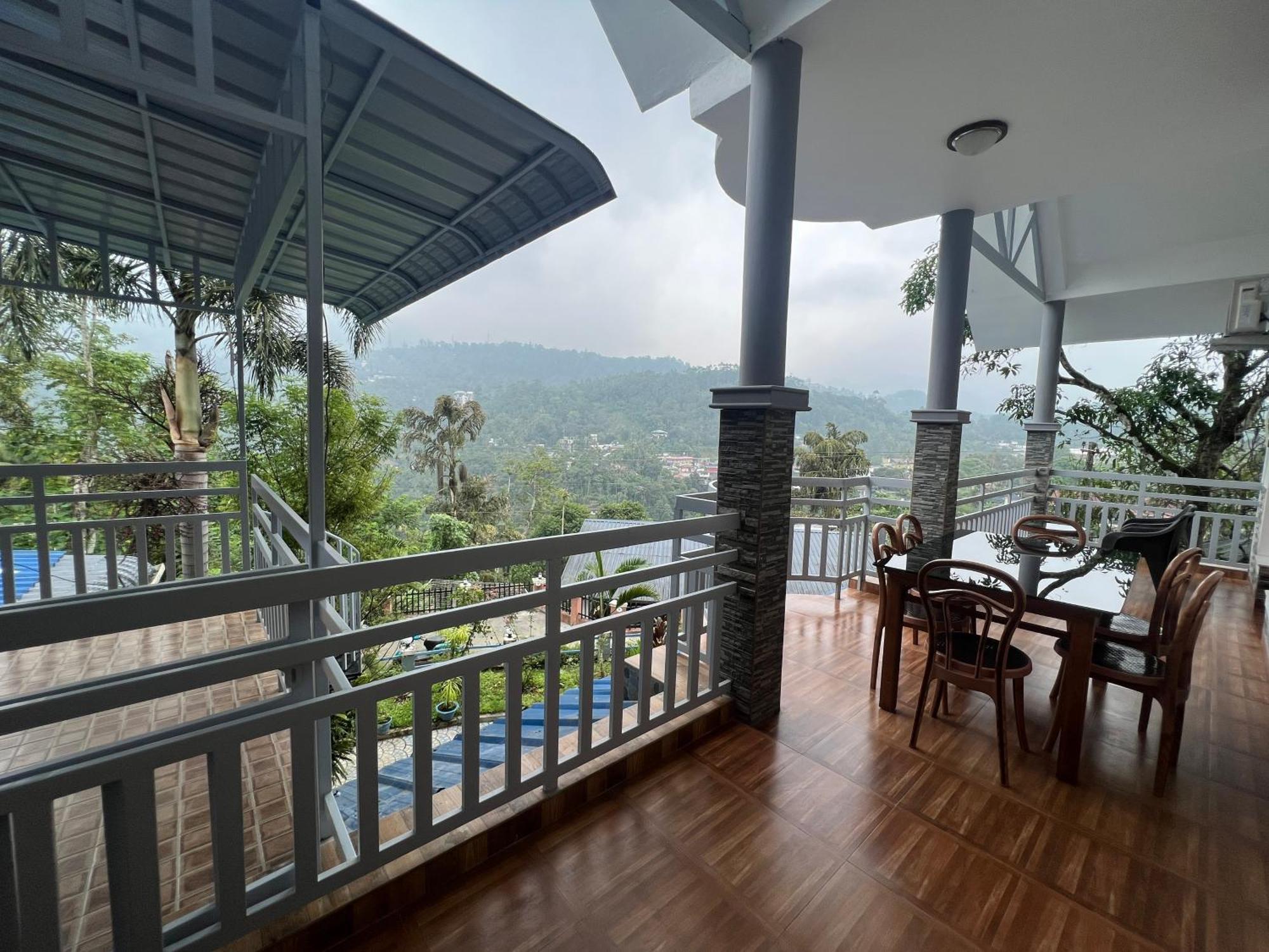 Munnar Blue Mist Acomodação com café da manhã Exterior foto