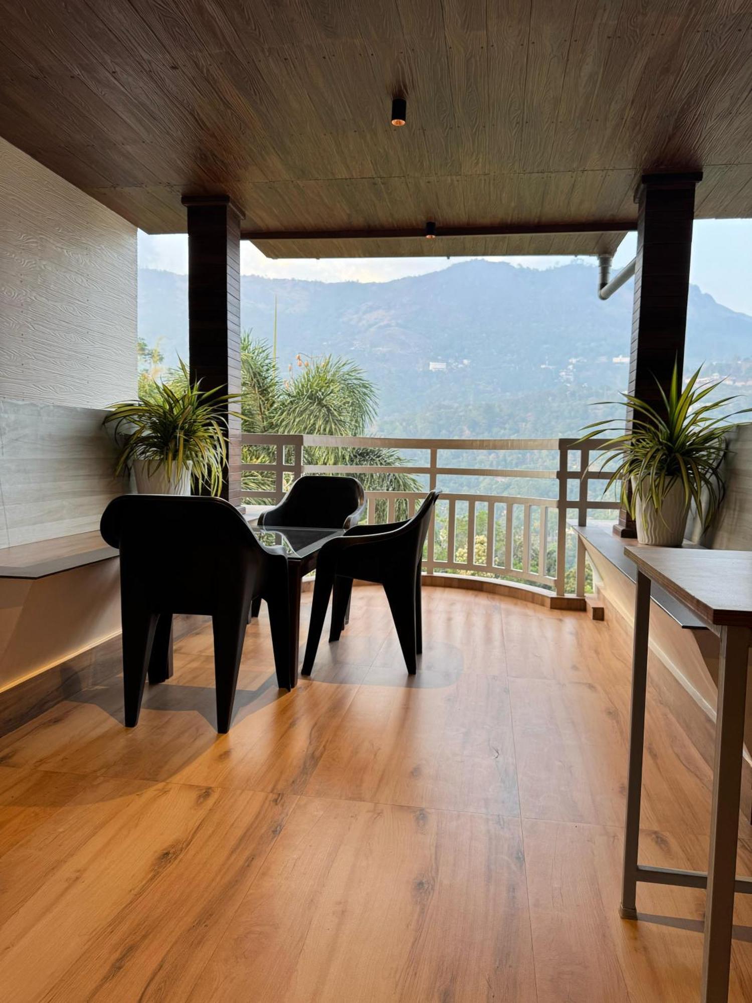 Munnar Blue Mist Acomodação com café da manhã Exterior foto