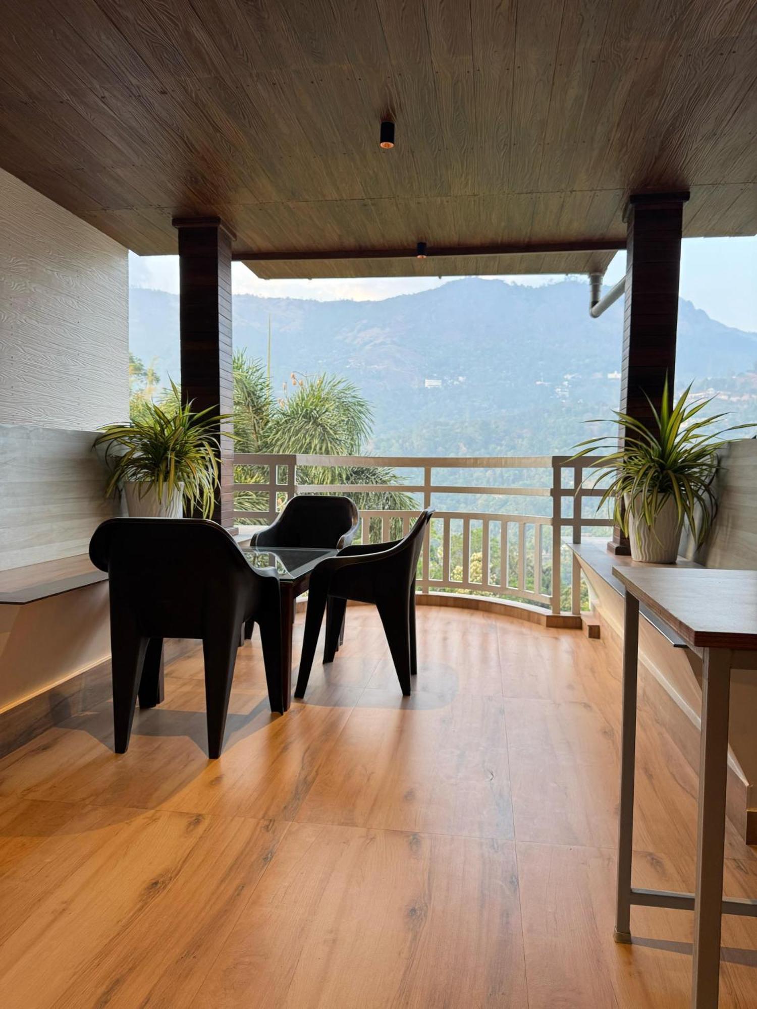 Munnar Blue Mist Acomodação com café da manhã Exterior foto