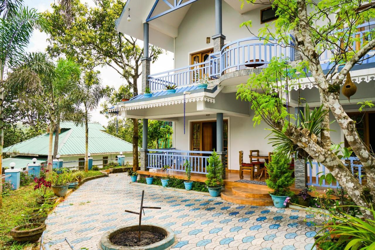 Munnar Blue Mist Acomodação com café da manhã Exterior foto