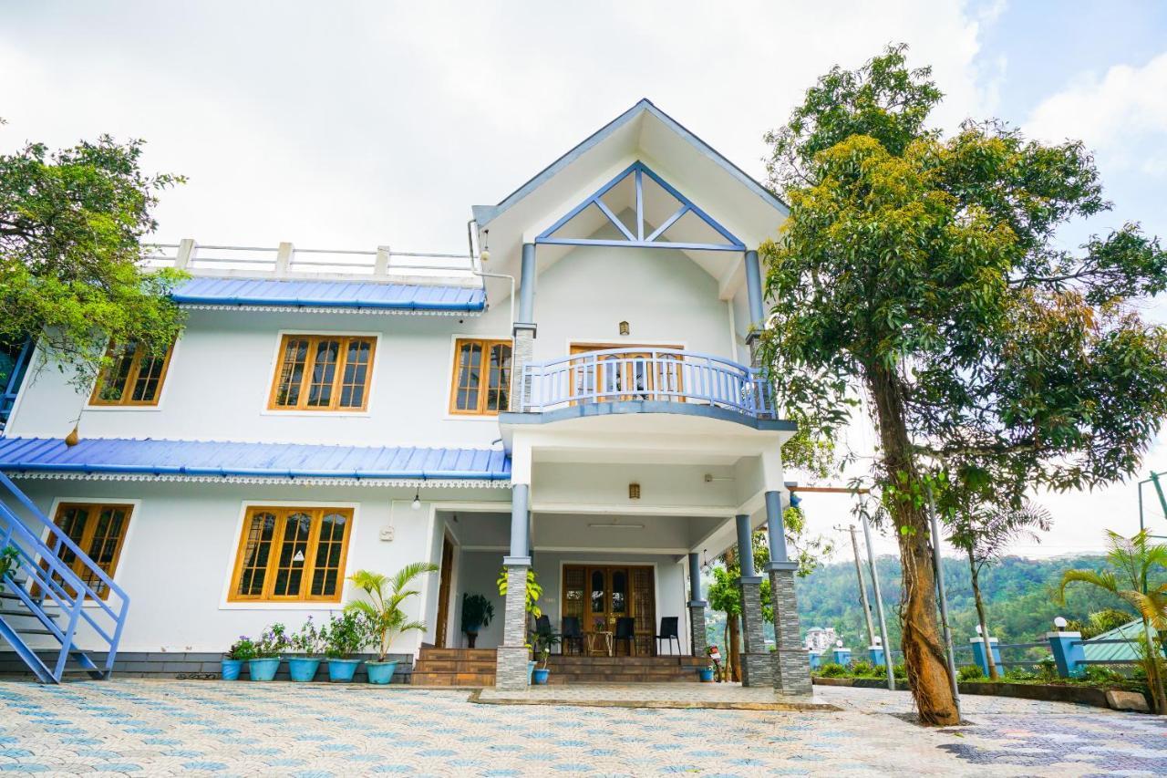 Munnar Blue Mist Acomodação com café da manhã Exterior foto