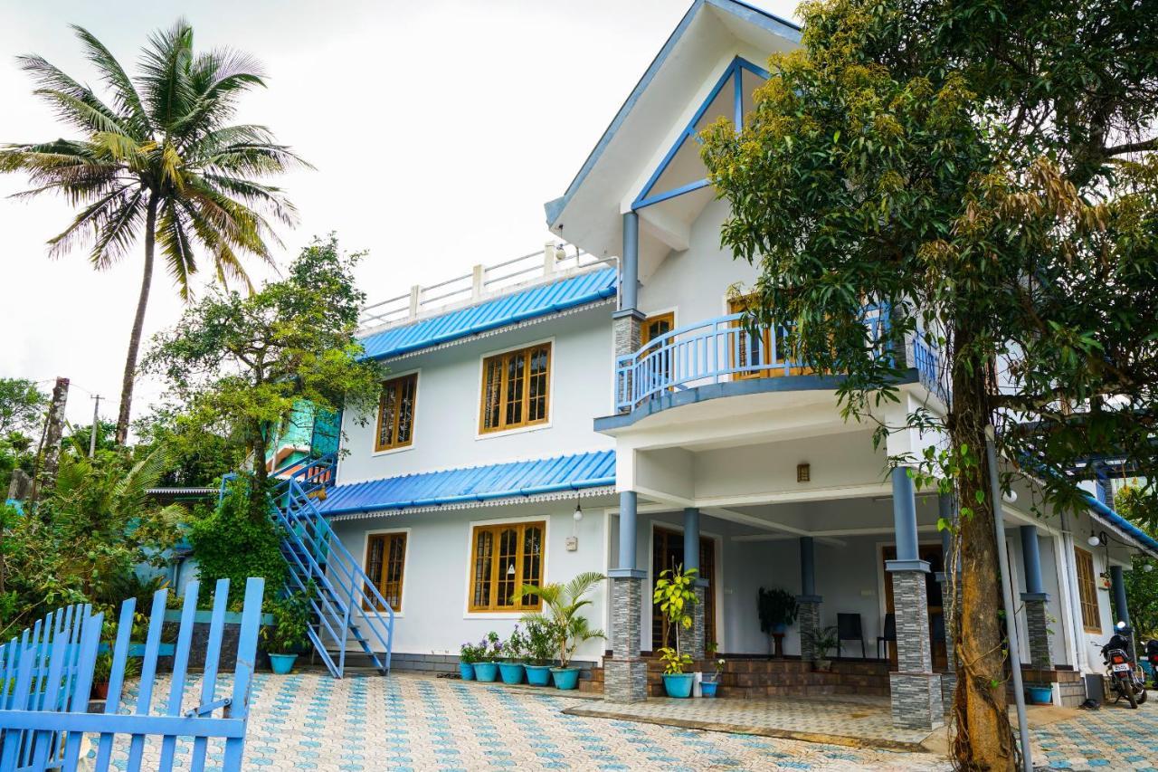 Munnar Blue Mist Acomodação com café da manhã Exterior foto